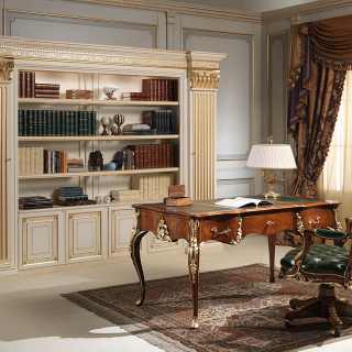 Louis XV style desk and armchair, walnut antique finish, handmade carvings, gold leaf details. Classic luxury bookcase, lacquered ivory finish with golden details, shelves hidden on the columns