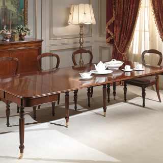 Classic walnut console-table extensible till cm 260 with 4 extensions, with wheels. Here fully extended