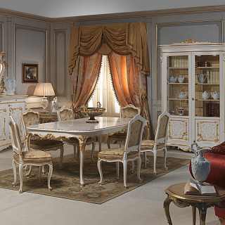 Luigi XV style dining room: carved table and chairs, sideboard with big carved mirror and glass showcase. All lacquered and gold finish, Venezia classic furniture collection