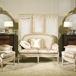 Classic living room Rialto collection, ivory fabric finish, carved details, white over gold finish. Carved screen and mirror