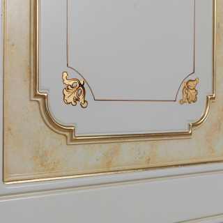 Classic modular wardrobe, withe and gold finish, golden stripes and flower decorations. Detail