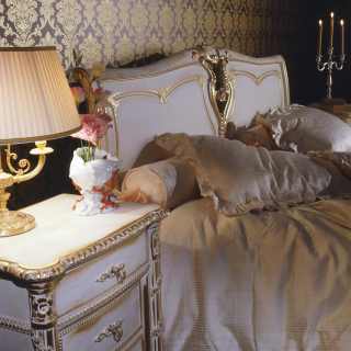 Classic bedroom Luigi XVI style: carved bed and night tables, white over gold finish