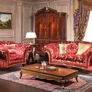 Classic living room Palace, red and gold fabric finish, composed by sofa and armchair with carved walnut details and a carved and inlayed table