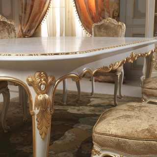 Luigi XV style dining room, Venezia classic collection: carved table, lacquered and gold finish. Detail of a carving
