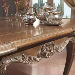 Detail of the handmade carvings for the Luigi XV style table, walnut decapé finish. Parigi classic luxury furniture collection