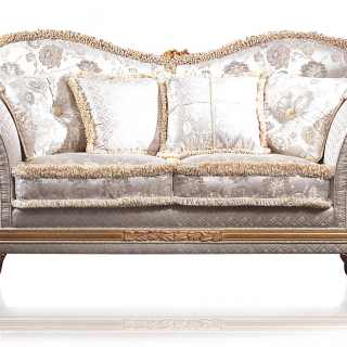 Classic sofa Excelsior with a particular wave shape. Carved and golden details and cymatium