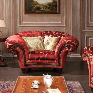 Classic living room Palace, red and gold fabric finish, composed by armchair with carved walnut details and a carved and inlayed table