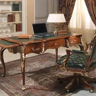 Classic luxury studio Luigi XV style: carved desk, walnut antique finish and gold details; Luigi XV style armchair